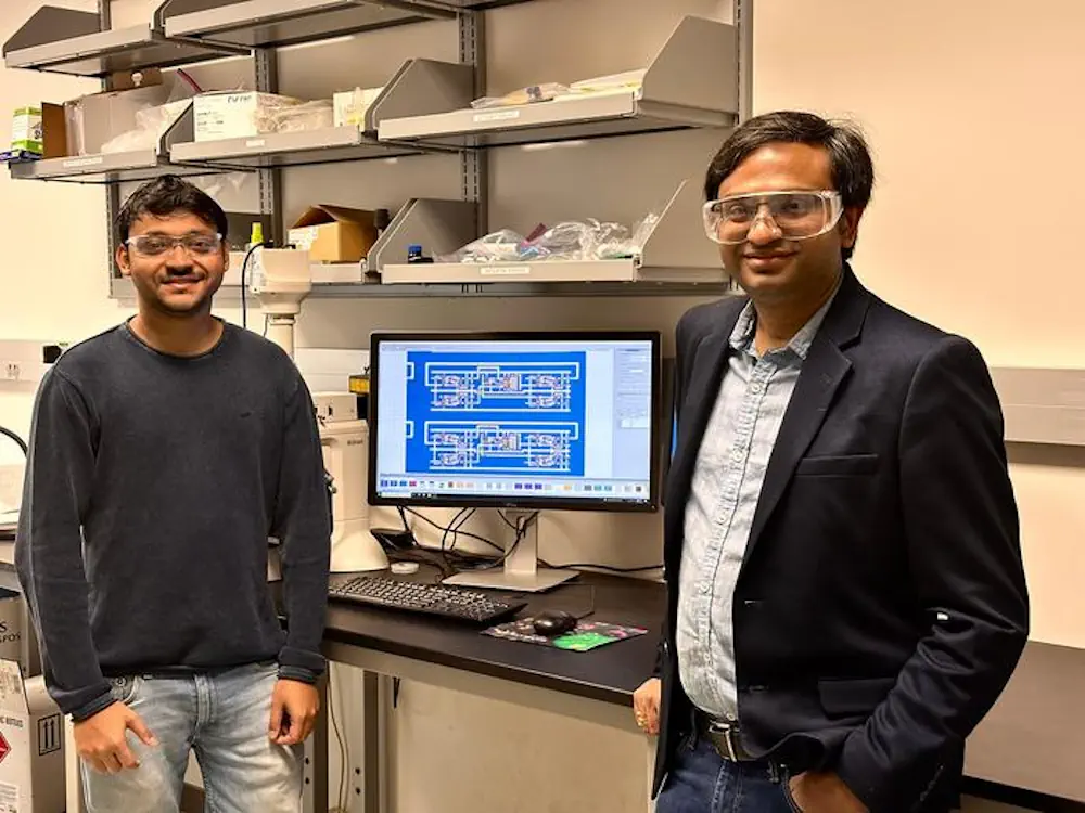Subir Ghosh, à gauche, et Saptarshi Das, à droite, ont dirigé une équipe qui a mis au point un ordinateur à métal-oxyde-semiconducteur complémentaire sans silicium capable d'effectuer des opérations simples. Entre eux, une image au microscope de l'ordinateur fabriqué.