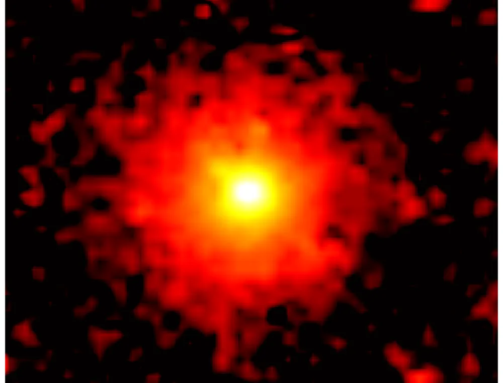 SPHEREx a découvert une coma de CO2 brillante (l'atmosphère gazeuse étendue d'une comète) entourant 3I/ATLAS. Elle s'étend sur au moins 348 000 km. Crédit : NASA/JPL-Caltech.