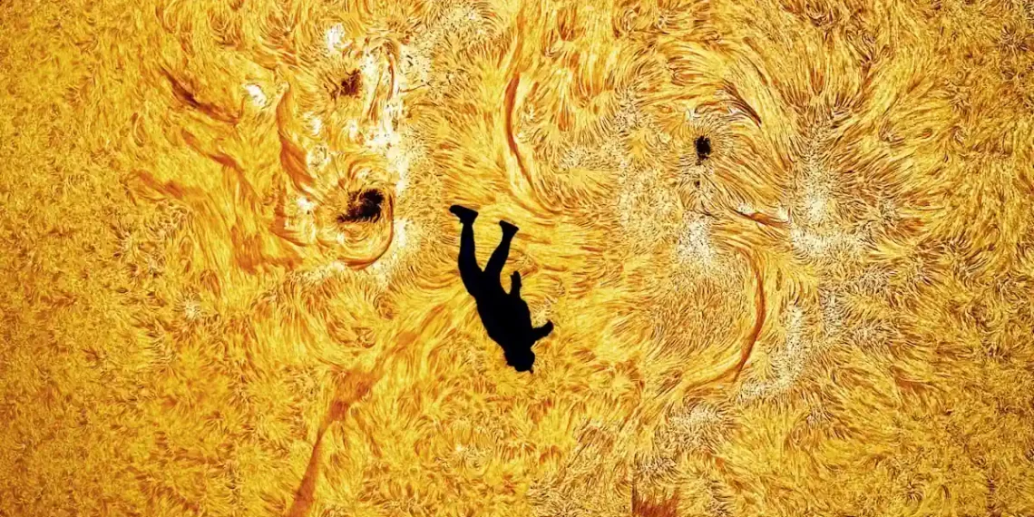 Capture exceptionnelle d'un parachutiste devant le soleil