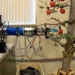 Low-cost, simple robotic apple picker arms like this one, developed by WSU researchers, may someday help with f