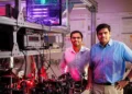 Sandia National Laboratories scientists Saaketh Desai, left, and Prasad Iyer, modernized an optics lab with a team of ar