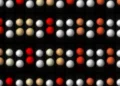 A stop-motion image that shows pairs of millimeter-scale beads forming a time crystal over approximately one-third of a