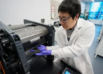 UChicago Pritzker School of Molecular Engineering (UChicago PME) Research Associate Professor Minghao Zhang collects a d