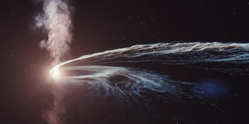 An artistic representation of a tidal disruption event, or a black hole shredding a star.