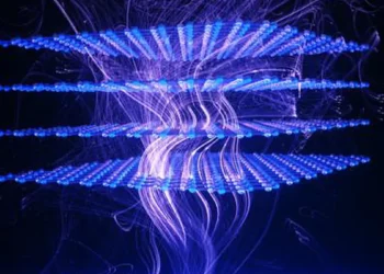 Les champs fluctuants dans le nitrure de bore hexagonal affectent la densité superfluide dans un supraconducteur situé à proximité immédiate. Crédit : Ella Maru Studio