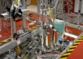 Un positon unique refroidi dans un piège de Penning